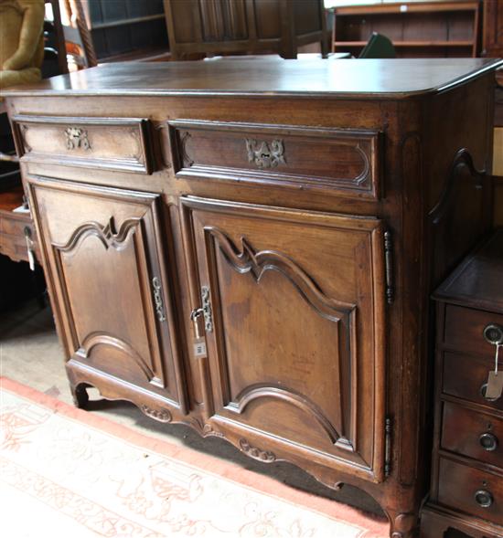 A 19th century French fruitwood dresser base, W.4ft 10in. D.1ft 10in. H.4ft